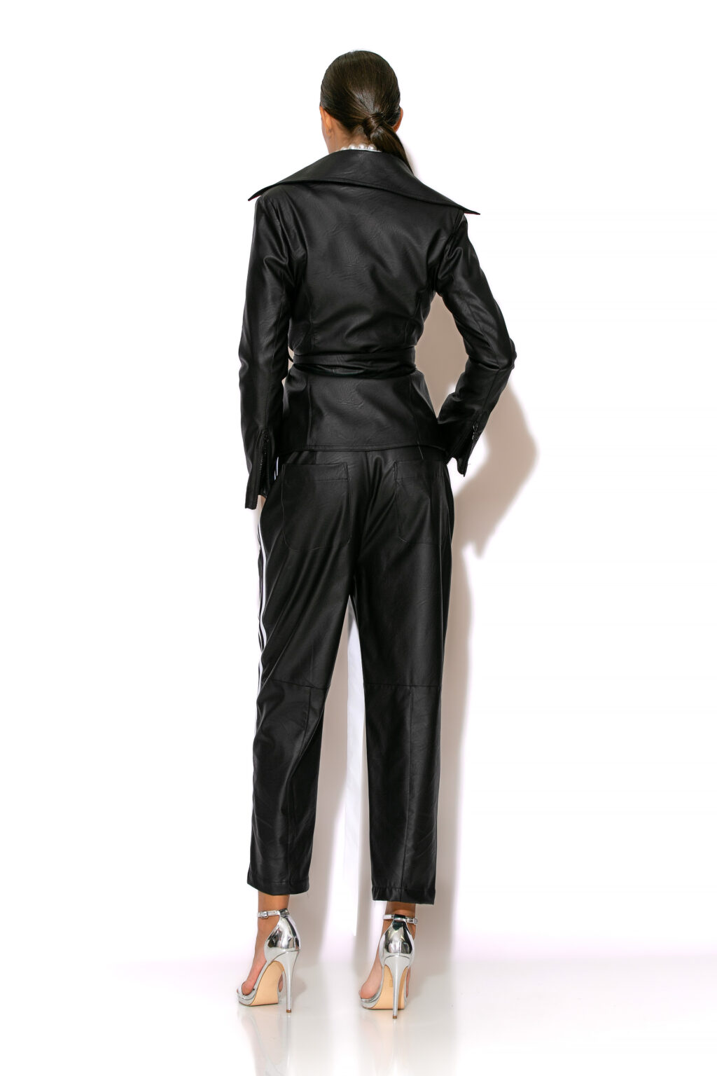 C-THROU Side striped High Waisted Faux Leather Pants With Back Pockets and zip front designed for a loose fit